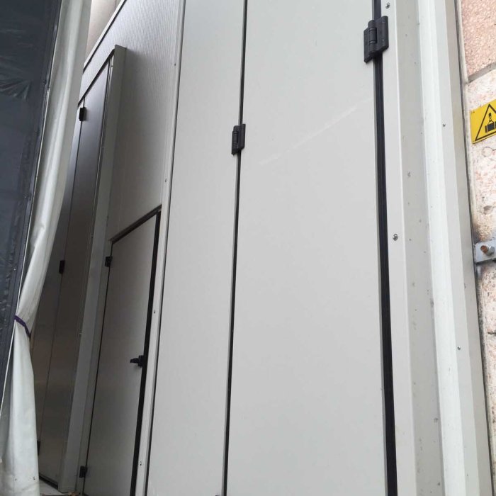 siemlift-porta-a-libro-isolante-con-porta-pedonale
